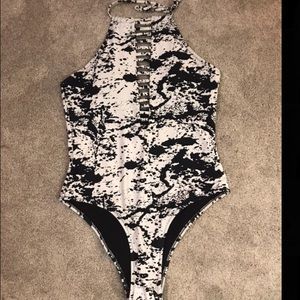 Speckled black and white one piece swimsuit